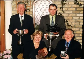  ??  ?? Tom O’Brien, Anthony Leonard, Margaret Bolton and Gerry Connolly ( R. I. P.) after St. Feichin’s won their first ever National Area Award.