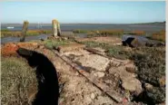  ??  ?? Ruins of jetties on The Swale, near Uplees, used for the loading of gunpowder (left).