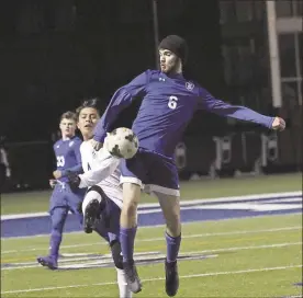  ?? / Scott Herpst ?? Ringgold defender Liam Lehmann tries to shield the ball from a Trion attacker during last week’s non-region match in Ringgold.