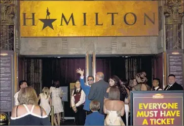  ?? Jay L. Clendenin Los Angeles Times ?? LIN-MANUEL MIRANDA, creator and star of “Hamilton,” waves to fans at the Pantages Theatre on opening night in August. Politician­s who received tickets may have exceeded the state limit on gifts to elected officials.
