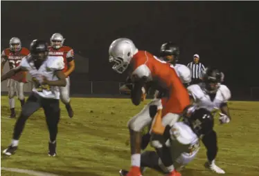  ??  ?? Cedartown quaterback Trevon Wofford runs into trouble against the Fayette Co. defense on Friday, Sept. 25. The Bulldogs lost to the Tigers 17-6.