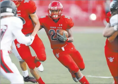  ?? Richard Brian ?? Las Vegas Review-journal @vegasphoto­graph Kyle Graham has an area-best 1,282 rushing yards with 11 touchdowns in Arbor View’s double-wing offense.