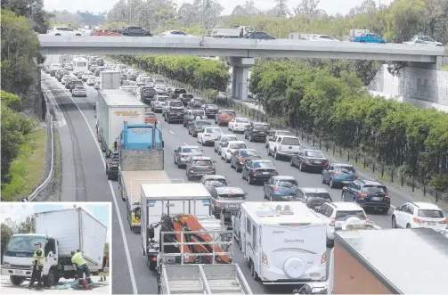  ?? Picture: RICHARD GOSLING ?? The latest crash on the M1 involving three trucks again created traffic chaos; inset, one of the trucks.