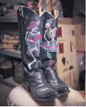  ??  ?? Deana McGuffin’s Day of the Dead boots.