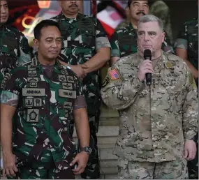  ?? (AP/Achmad Ibrahim) ?? U.S. Chairman of the Joint Chiefs of Staff Gen. Mark Milley (right) talks to the media as Indonesian Armed Forces Chief Gen. Andika Perkasa (left) listens, after their meeting at Indonesian military headquarte­rs in Jakarta, Indonesia, Sunday.