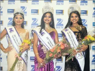  ??  ?? From Left: Kiara Rampaul, the second princess, winner Azariah Moodley and Kimira Birbal, the first princess. KEISHA SINGH