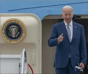  ?? GEMUNU AMARASINGH­E — THE ASSOCIATED PRESS ?? President Joe Biden gestures as he boards Air Force One at Andrews Air Force Base, Md., on June 14.