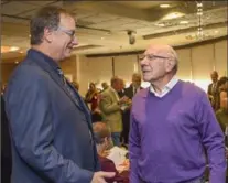  ?? GARY YOKOYAMA, THE HAMILTON SPECTATOR ?? CFL legend Russ Jackson, a member of the inaugural Hamilton Sports Hall of Fame class of 2010, talks with Mark Bowden at Tuesday’s ceremony.