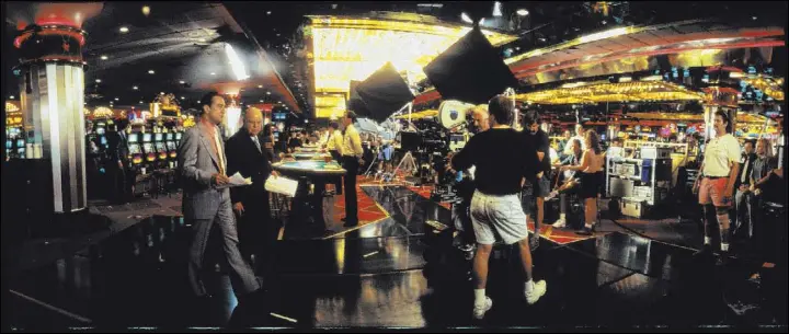  ?? Universal Pictures ?? Above, Robert De Niro and Don Rickles are shown while filming “Casino” inside the Riviera. Below, director Martin Scorsese shoots a scene.