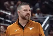  ?? MICHAEL THOMAS — THE ASSOCIATED PRESS, FILE ?? Texas head coach Chris Beard looks on during the first half against UTEP on Nov. 7in Austin, Texas. Travis County District Attorney Jose Garza on Wednesday moved to dismiss a felony domestic violence case against Beard, in part because of alleged victim's wishes not to prosecute.