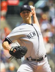  ?? Daniel Shirey / Getty Images ?? The Yankees’ J.A. Happ pitches during the first inning against the Giants on Saturday at Oracle Park in San Francisco.