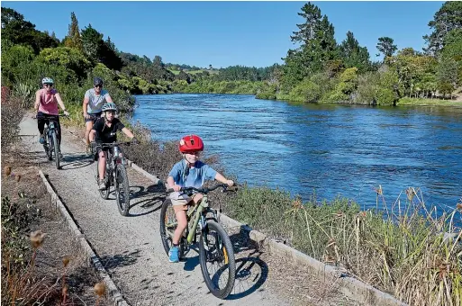  ?? SUPPLIED ?? With sections ranging from easy to expert, the Waikato River Trails cater for cyclists of all abilities.