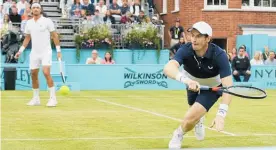  ?? Photo / AP ?? Britain’s Andy Murray plays a return during his men’s final with doubles partner, Spain’s Feliciano Lopez.