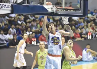  ??  ?? THE TNT KaTropa try to halt a streaking San Miguel Beermen in Game One of their best-of-seven semifinal series today at the Smart Araneta Coliseum.