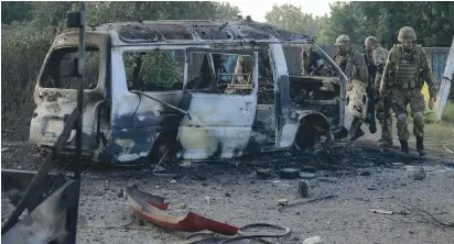  ??  ?? A VAN destroyed during fighting in eastern Ukraine’s Donbas conflict which is now in its fourth year.