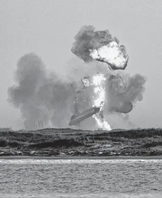  ?? William Luther / Staff photograph­er ?? The Spacex Starship SN10 explodes Wednesday after landing at the Boca Chica launchpad. Its two predecesso­rs landed hard and exploded, but the latest prototype did land upright first.