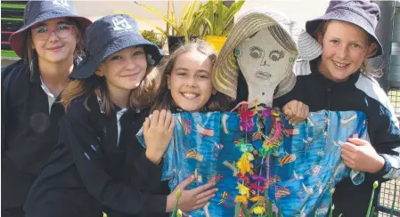  ?? Pictures: Megan Stenner ?? THRIVING: Toowoomba East State School Garden Club student members (from left) Neave Warry, Layla Hallard, Alyssa Daw and Georgia Cussons.