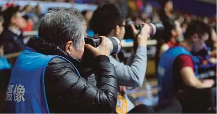  ?? AFP PIC ?? Hong Nanli at a basketball match in Shanghai on Tuesday.