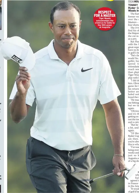  ??  ?? RESPECT FOR A MASTER Tiger Woods acknowledg­es the crowd as he walks to the 18th green at Augusta