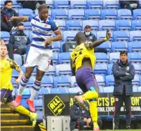  ??  ?? Meite leaps as Paunovic watches on from the touchline