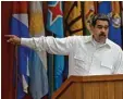  ?? Foto: afp ?? Venezuelas Präsident Maduro streicht fünf Nullen aus dem Bolivar.