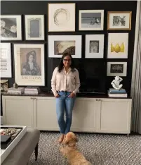  ?? MAYA CONIKER ?? Interior decorator Vanessa Francis, under the watchful eye of her dog, Ellie, says her gallery wall of travel photos and prints lends personal meaning and visual interest to her Milton home.