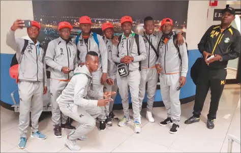  ??  ?? FUN IN THE ETERNAL CITY ... CAPS United players look a relaxed lot at the internatio­nal airport in the Italian capital Rome where they took another flight to Algiers for tomorrow’s doe-or-die CAF Champions League showdown