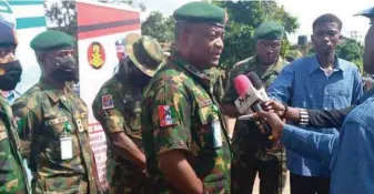  ??  ?? GOC 81 Division, Major General Lawrence Fejokwu, fielding questions after the outreach