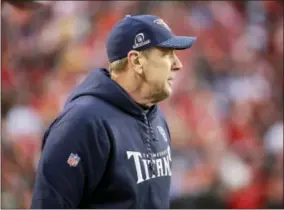  ?? CHARLIE RIEDEL — THE ASSOCIATED PRESS ?? Tennessee Titans head coach Mike Mularkey follows the first half of an NFL wild-card playoff football game against Kansas City Chiefs in Kansas City, Mo., Saturday. The Tennessee Titans won 22-21.