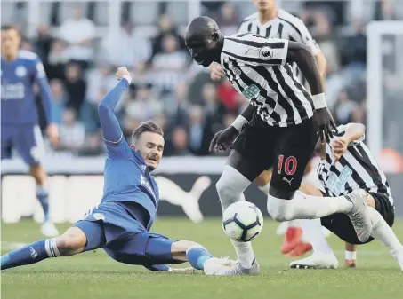  ??  ?? Newcastle United’s Mohamed Diame battles for the ball with Leicester City’s James Maddison.