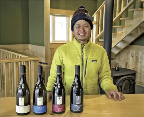  ?? The Yomiuri Shimbun ?? Taichi Yamazaki talks about the future of community-based winemaking at the Yamazaki Winery in Mikasa, Hokkaido.