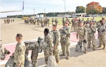  ?? — AFP photo ?? Troops and equipment prepare for departure from Fort Campbell, Kentucky in support of Operation Faithful Patriot.