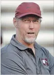  ?? CATHIE COWARD THE HAMILTON SPECTATOR ?? Now-suspended McMaster Marauders head coach Greg Knox, of Peterborou­gh, watches practice from the sidelines on Aug. 15.