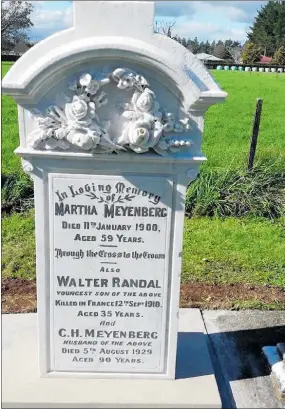  ??  ?? AFTER: A new headstone has been installed to honour the three members of the family.