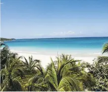  ??  ?? Flamenco Beach is a long crescent of white sand edged by turquoise water on Culebra, a sparsely populated cay off Puerto Rico’s east coast.