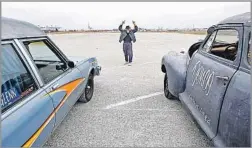  ?? Kirk McKoy Los Angeles Times ?? STREET RACERS return to the Terminal Island site of Brotherhoo­d Raceway Park, which operated on and off for 20 years, officially closing in 1995.