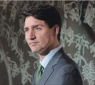  ?? ADRIAN WYLD THE CANADIAN PRESS ?? Prime Minister Justin Trudeau brought up the tariffs during a dinner with President Trump in France, hosted by French President Emmanuel Macron.