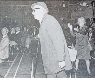  ??  ?? Shaking a stick: Paddy Harris takes on the Prime Minister in 1981, ahead of the election, which National won.