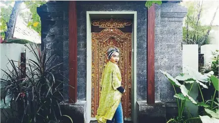  ??  ?? Yuna in Bali, Indonesia. She likes to visit places that are not too crowded and where she can learn its history.