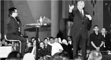  ??  ?? Zahid talks at the National Social Council’s town hall session at Internatio­nal Convention Centre. – Bernama photo