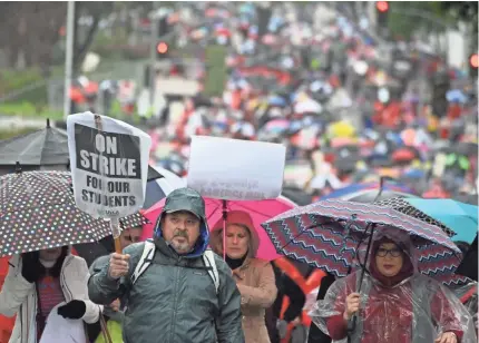  ?? ROBERT HANASHIRO/USA TODAY ?? Thousands of teachers and supporters march in downtown Los Angeles on the offices of the Unified School District, the nation’s second-largest. “Education is a right! That is why we have to fight!” some shouted.