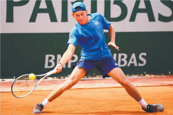  ?? Picture: GETTY ?? DETERMINED: Alex de Minaur — in action at the French Open — says over-training led to an enforced eight-week spell this year.