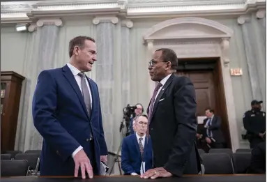  ?? (AP/J. Scott Applewhite) ?? Sen. Ted Budd, R-N.C. (left) speaks Wednesday with Acting Administra­tor of the Federal Aviation Administra­tion Billy Nolen as he appears before the Senate Commerce, Science, and Transporta­tion Committee to examine recent failures in the FAA’s NOTAM system, at the Capitol in Washington.