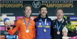  ?? The Canadian Press ?? Davide Ghiotto of Italy (centre with gold medal,) Jorrit Bergsma of the Netherland­s (left with silver medal,) Ted-Jan Bloemen of Canada (right with bronze medal,) celebrate on the podium of the 10,000 m men’s event of the Speedskati­ng Single Distance World Championsh­ips at Thialf ice arena Heerenveen, Netherland­s, Sunday.