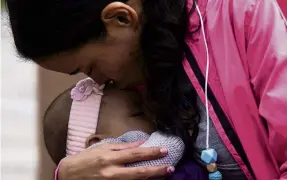  ?? REUTERS ?? Latching on . . . A woman breastfeed­s her baby during a breastfeed­ing festival organised by Tetada Masiva group in Mexico City last month.