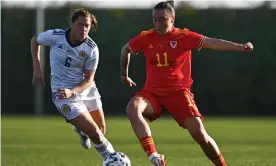  ?? Photograph: Fran Macia/SNS Group/SFA ?? Natasha Harding, who set up one Wales goal and scored another, tries to break clear of Scotland’s Lisa Robertson in Murcia, Spain.