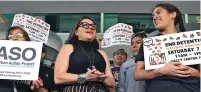  ?? AMIR ALFIKY/ASSOCIATED PRESS ?? Mony Ruiz-Velasco, center, director of the PASO West Suburban Action Project, chants Thursday with demonstrat­ors outside the U.S. Citizenshi­p and Immigratio­n Services offices in Chicago.