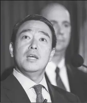  ?? AP PHOTO ?? Acting U.S. Attorney for the Southern District of New York Joon H. Kim speaks at a news conference after announcing the arrest of four assistant basketball coaches from Arizona, Auburn, the University of Southern California and Oklahoma State on...