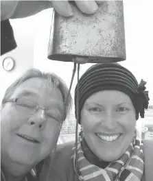  ??  ?? Licia and her husband Stephen ring the radiation victory bell at the Tom Baker Cancer Centre on Nov. 12, 2015, following her six gruelling rounds of chemothera­py and 20 rounds of radiation.