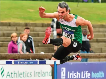  ?? SAM BARNES/SPORTSFILE ?? Thomas Barr of Ferrybank AC storms to his eighth national title in yesterday’s men’s 400m hurldes at Morton Stadium in Santry